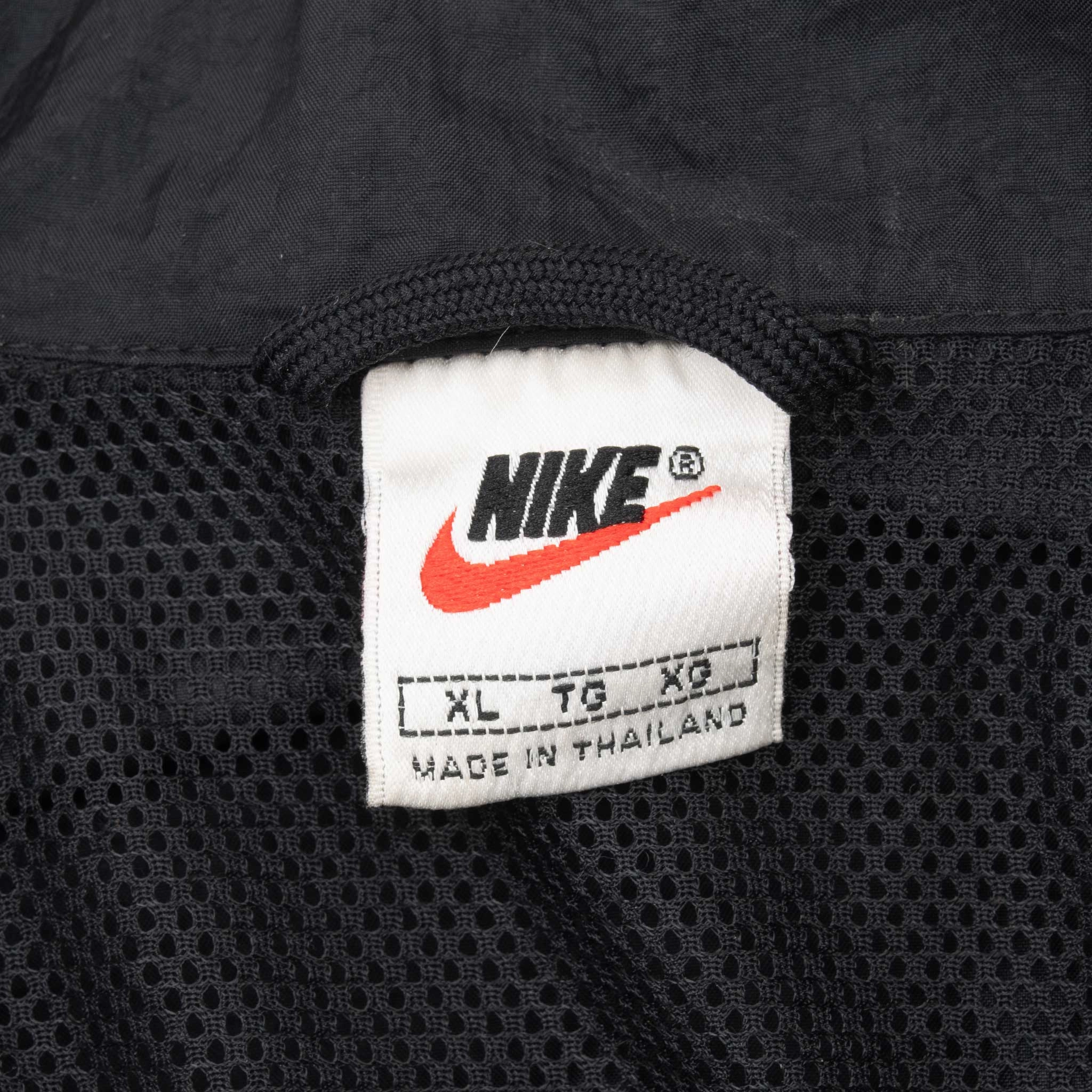 VINTAGE NIKE BIG SWOOSH BLUE AND BLACK WINDBREAKER JACKET 1990S XL