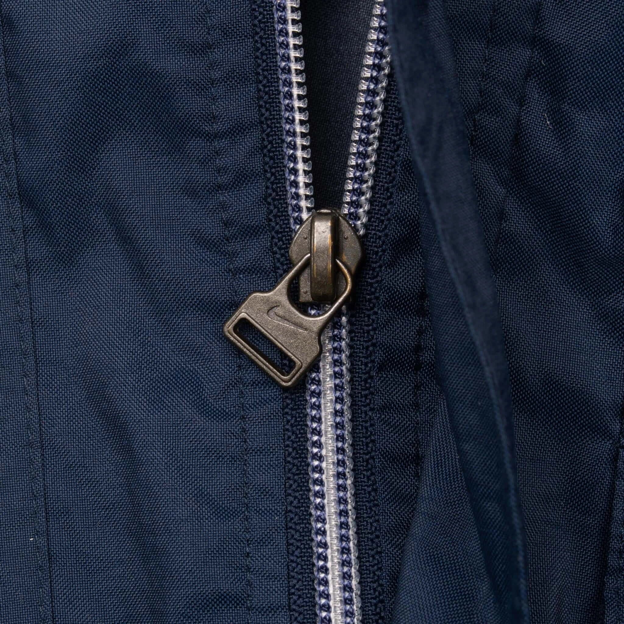 VINTAGE NIKE BLUE WINDBREAKER JACKET 2000S LARGE