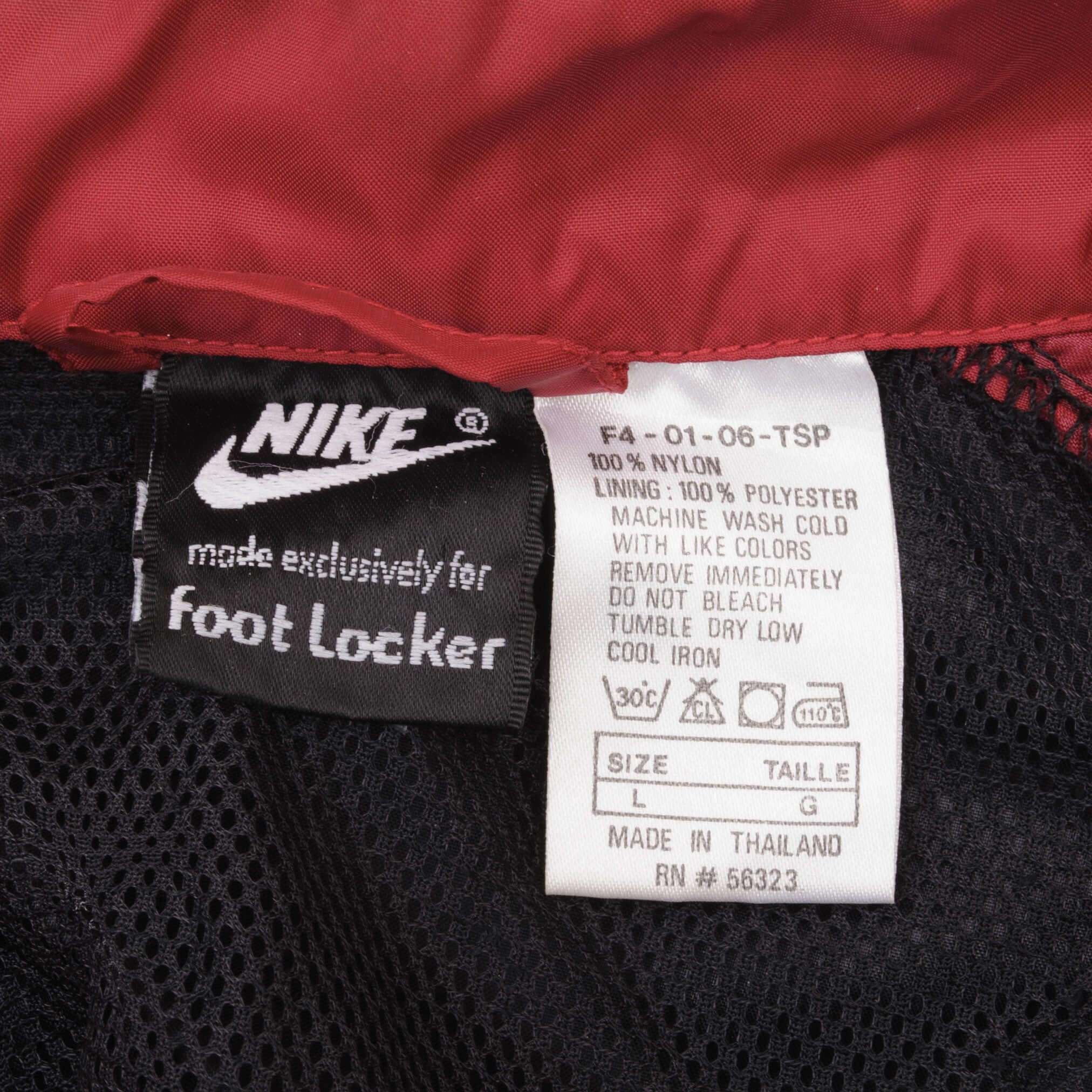VINTAGE NIKE FOOT LOCKER NYLON WINDBREAKER JACKET SIZE LARGE 1990s