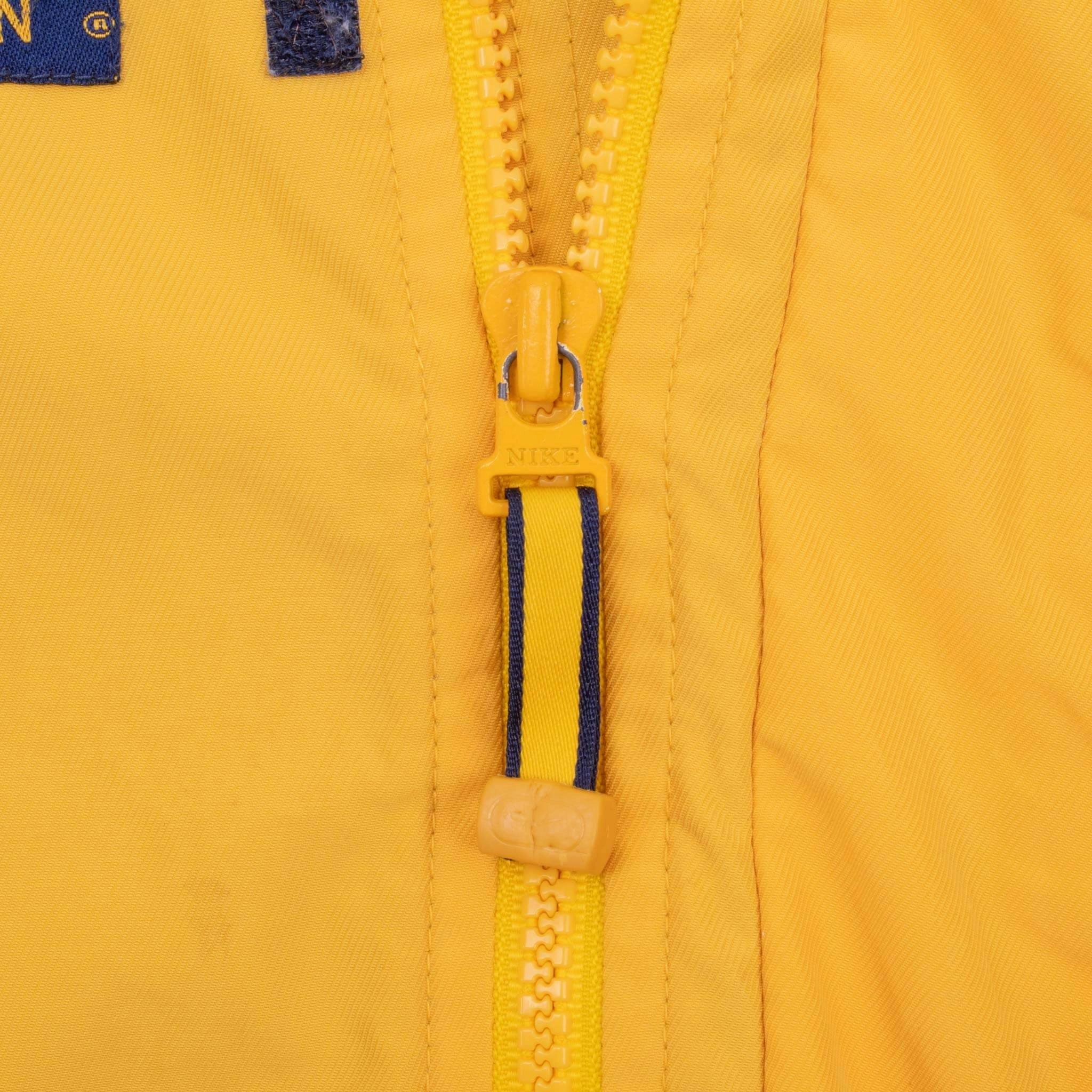 VINTAGE NIKE NCAA MICHIGAN UNIVERSITY YELLOW WINDBREAKER JACKET 1990S XL