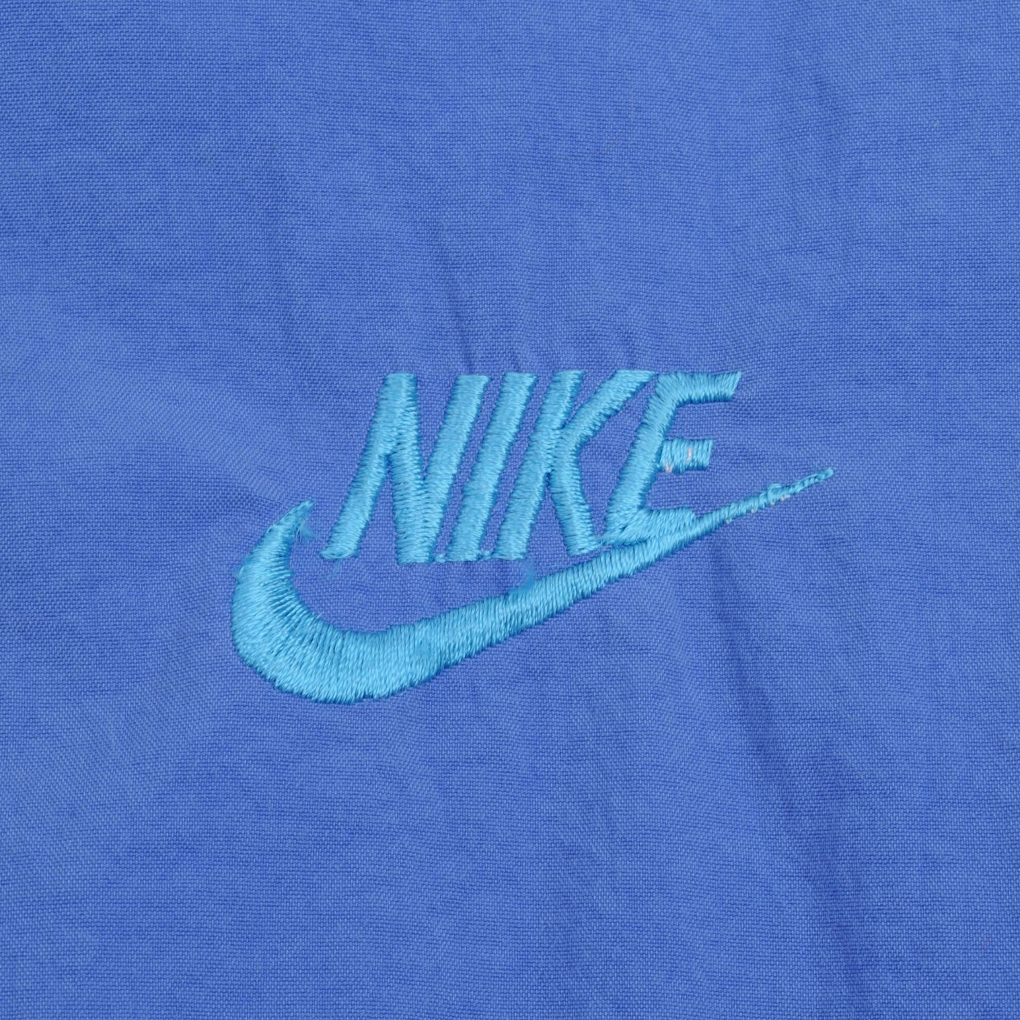 VINTAGE NIKE SWOOSH BLUE WINDBREAKER JACKET 1980S SIZE MEDIUM